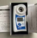 Restored Atago PAL-1 pocket Brix refractometer backed by National Industrial Supply 5-year warranty.